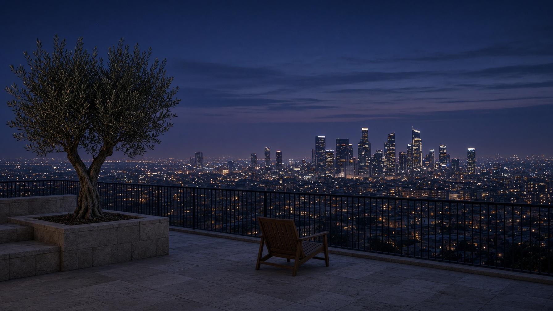 Dusk terrace overlooking a city skyline